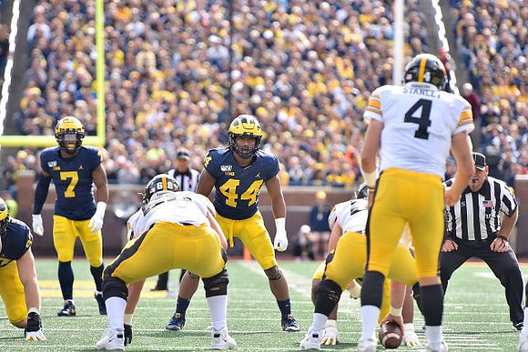 Khaleke Hudson (7) and Cameron McGrone (44)