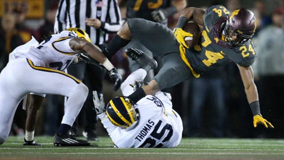 Jarrod Wilson (22) and Dymonte Thomas (25)