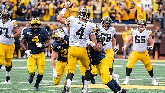 Michael Danna (4), Jordan Glasgow (29), and Khaleke Hudson (7)