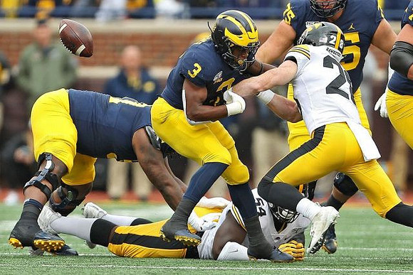 Michael Onwenu (50), Christian Turner (3), and Jon Runyan Jr. (75)