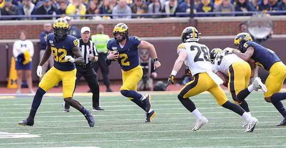 Nick Eubanks (82), Shea Patterson (2), and Ronnie Bell (8)