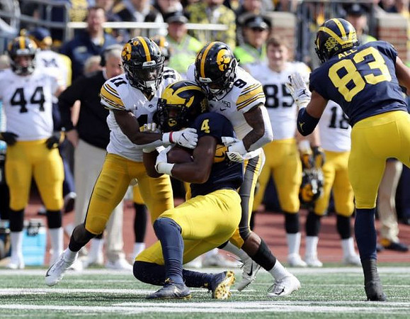 Nico Collins (4) and Erick All (83)