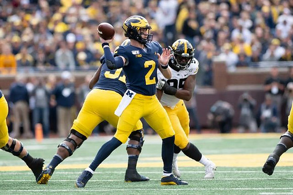 Cesar Ruiz (51) and Shea Patterson (2)