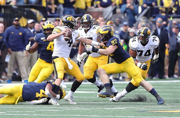 Cameron McGrone (44), Michael Danna (4), and Aidan Hutchinson (97)