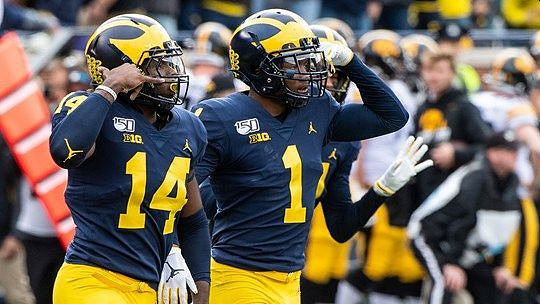Josh Metellus (14) and Ambry Thomas (1)