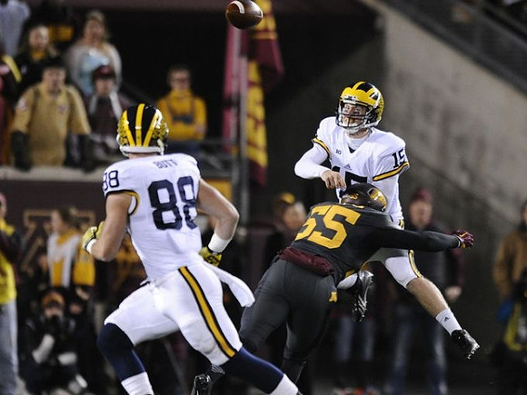 Jake Butt (88) and James Ross (15)