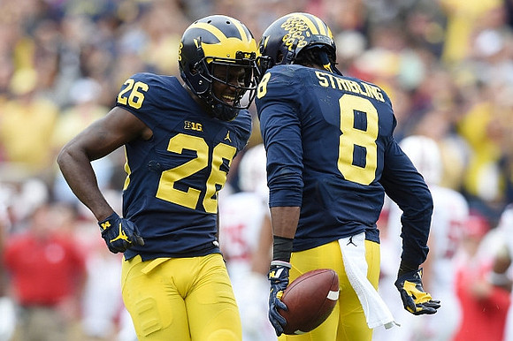 Jourdan Lewis (26) and Channing Stribling (8)