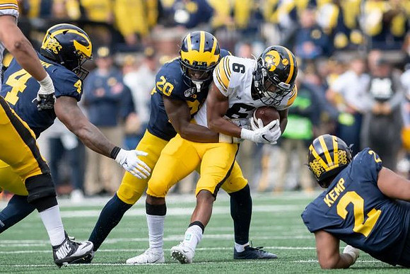 Michael Danna (4), Brad Hawkins (20), and Carlo Kemp (2)