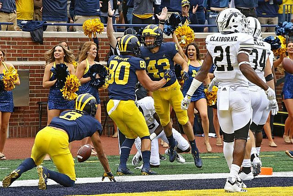 Ronnie Bell (8), Oliver Martin (80), and Jake McCurry (43)