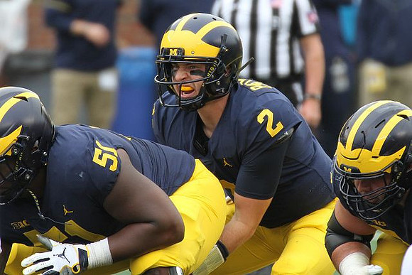 Cesar Ruiz (51) and Shea Patterson (2)
