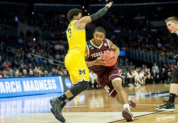 Zavier Simpson (3) and Moritz Wagner (13)