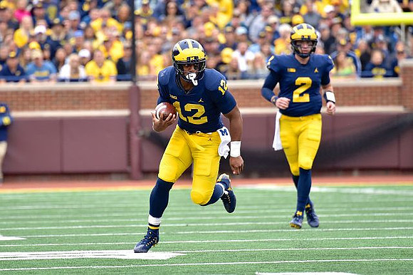 Chris Evans (12) and Shea Patterson (2)