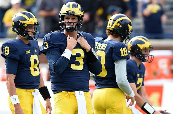 John O'Korn (8), Wilton Speight (3), and Brandon Peters (18)