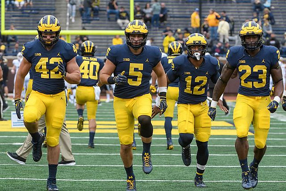 Ben Mason (42), Ryan Nelson (40), Jared Wangler (5), Chris Evans (12), and O'Maury Samuels (23)