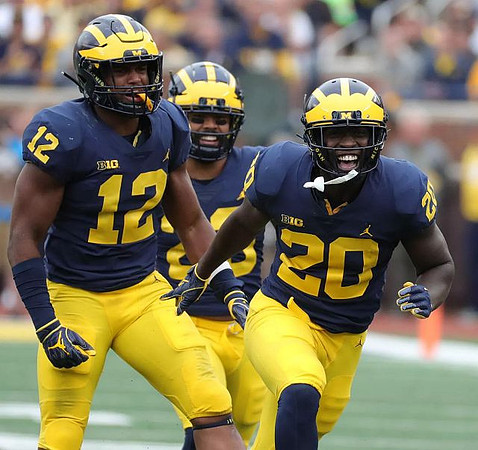 Josh Ross (12), Brandon Watson (28), and Brad Hawkins (20)