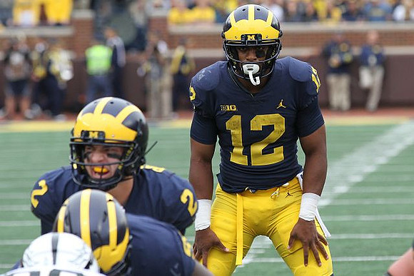 Shea Patterson (2) and Chris Evans (12)