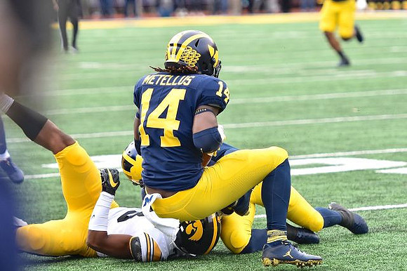 Josh Metellus (14) and Ambry Thomas (1)