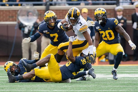 Jordan Glasgow (29), Khaleke Hudson (7), Daxton Hill (30), and Brad Hawkins (20)