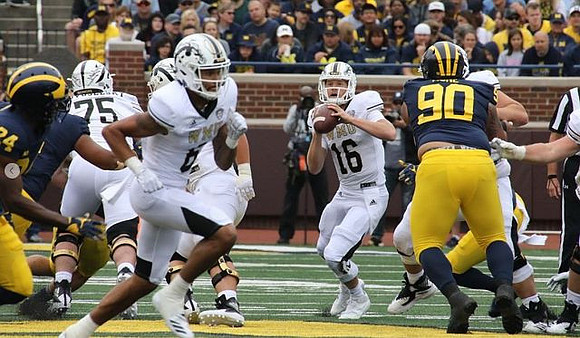 Lavert Hill (24) and Bryan Mone (90)