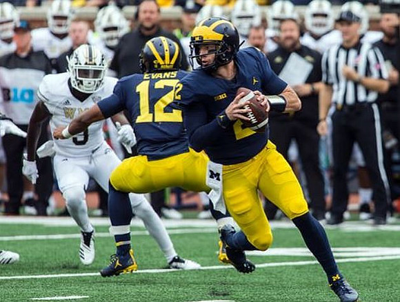 Chris Evans (12) and Shea Patterson (2)