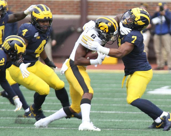 Vincent Gray (31), Michael Danna (4), and Khaleke Hudson (7)