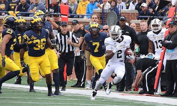 Tyree Kinnel (23), Devin Gil (36), and Khaleke Hudson (7)