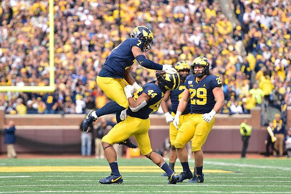 Khaleke Hudson (7), Cameron McGrone (44), Carlo Kemp (2), and Jordan Glasgow (29)