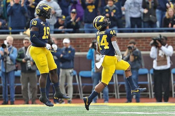 Kwity Paye (19) and Cameron McGrone (44)