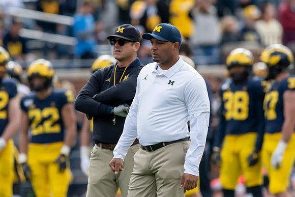 Josh Gattis and Jim Harbaugh