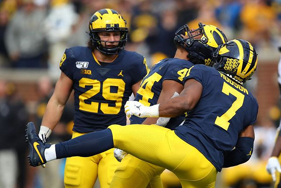 Jordan Glasgow (29), Cameron McGrone (44), and Khaleke Hudson (7)