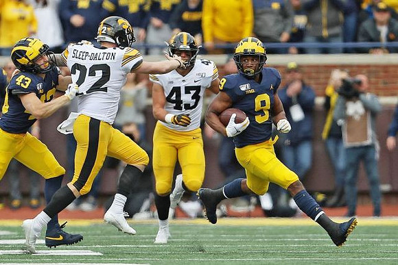 Jake McCurry (43) and Donovan Peoples-Jones (9)