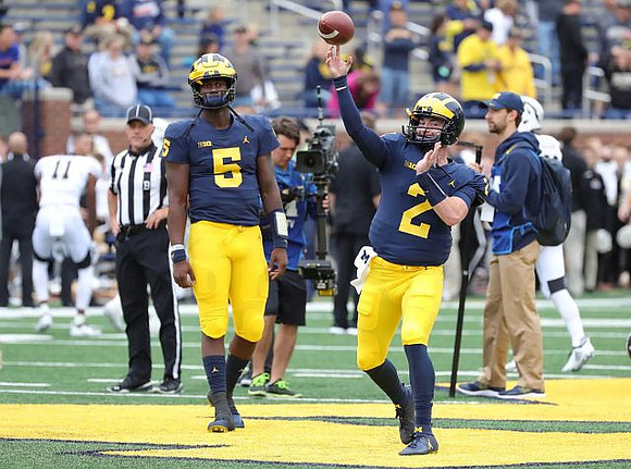 Joe Milton (5) and Shea Patterson (2)
