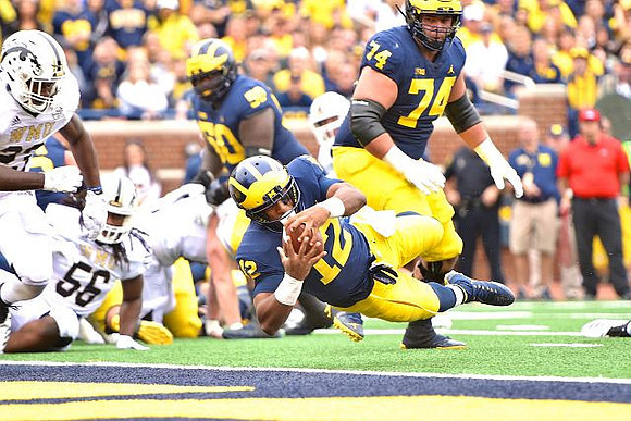 Michael Onwenu (50), Ben Bredeson (74), and Chris Evans (12)
