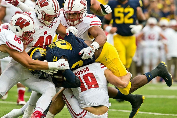 Jehu Chesson (86) and Mason Cole (52)