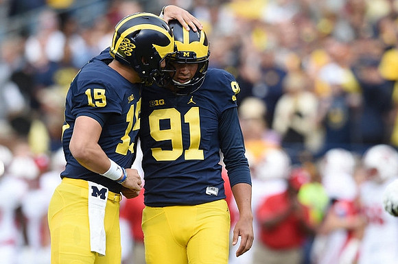 Garrett Moores (15) and Kenny Allen (91)