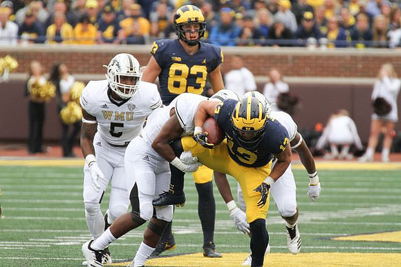 Zach Gentry (83) and Tru Wilson (13)