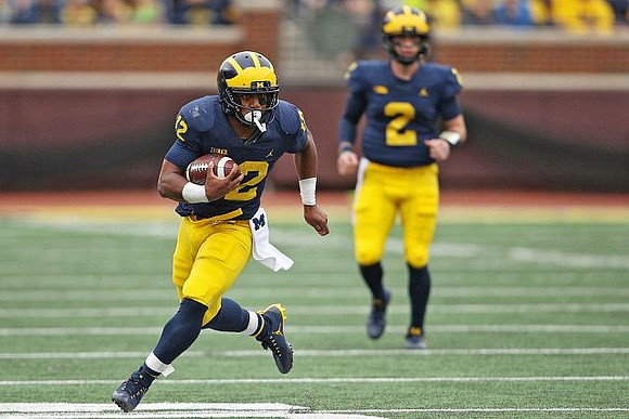 Chris Evans (12) and Shea Patterson (2)