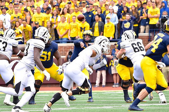 Cesar Ruiz (51), Shea Patterson (2), Ben Bredeson (74), and Sean McKeon (84)