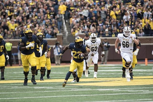 Michael Onwenu (50), Juwann Bushell-Beatty (76), Cesar Ruiz (51), and Karan Higdon (22)