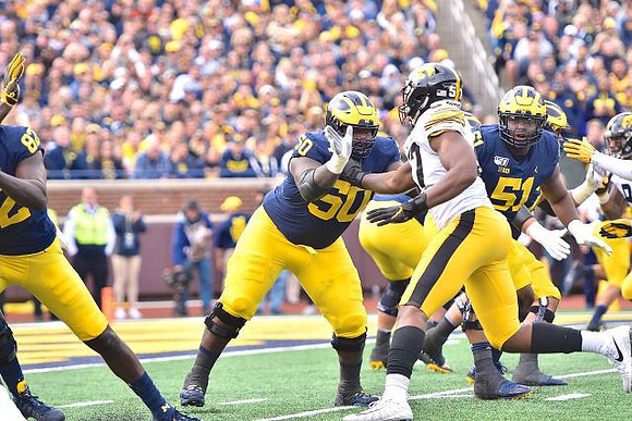 Nick Eubanks (82), Michael Onwenu (50), and Cesar Ruiz (51)