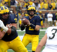 Ben Bredeson (74) and Shea Patterson (2)