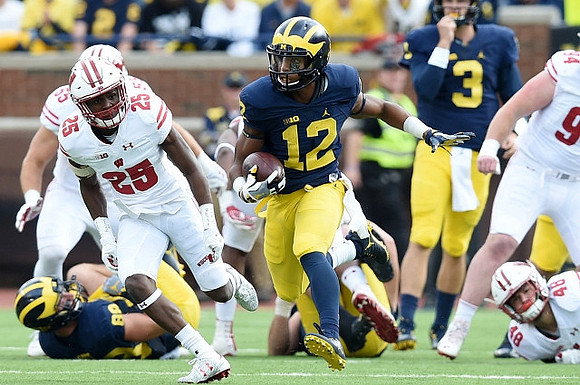 Jake Butt (88), Chris Evans (12), and Wilton Speight (3)