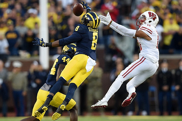 Delano Hill (44) and Channing Stribling (8)