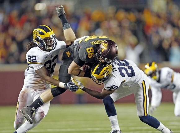 Jarrod Wilson (22) and Jourdan Lewis (26)