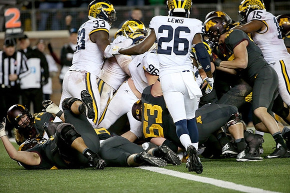 Taco Charlton (33), Ryan Glasgow (96), Jourdan Lewis (26), and James Ross (15)