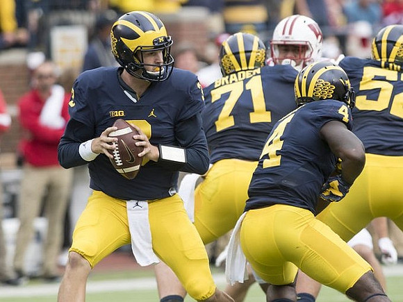 Wilton Speight (3), Ben Braden (71), De'Veon Smith (4), and Mason Cole (52)