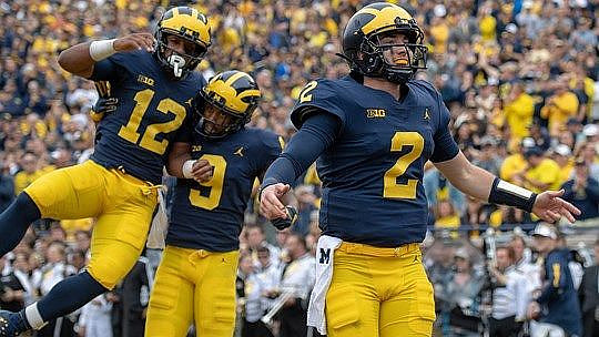 Chris Evans (12), Donovan Peoples-Jones (9), and Shea Patterson (2)