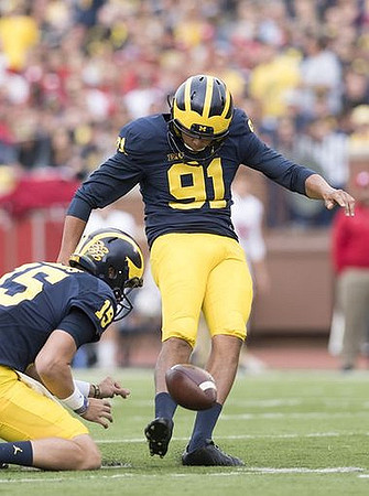 Garrett Moores (15) and Kenny Allen (91)