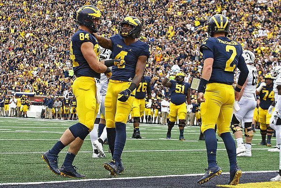 Sean McKeon (84), Nico Collins (4), Shea Patterson (2), Juwann Bushell-Beatty (76), Cesar Ruiz (51), and Ben Bredeson (74)
