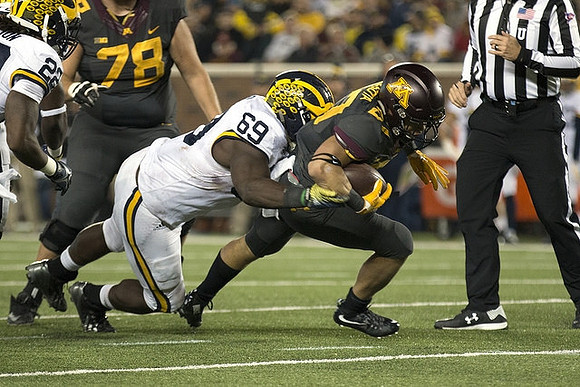Jarrod Wilson (22) and Willie Henry (69)